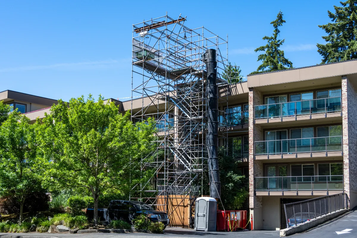 Condo remodeling in Los Angeles with multi-unit building renovation, exterior construction access, scaffolding, and property improvement work