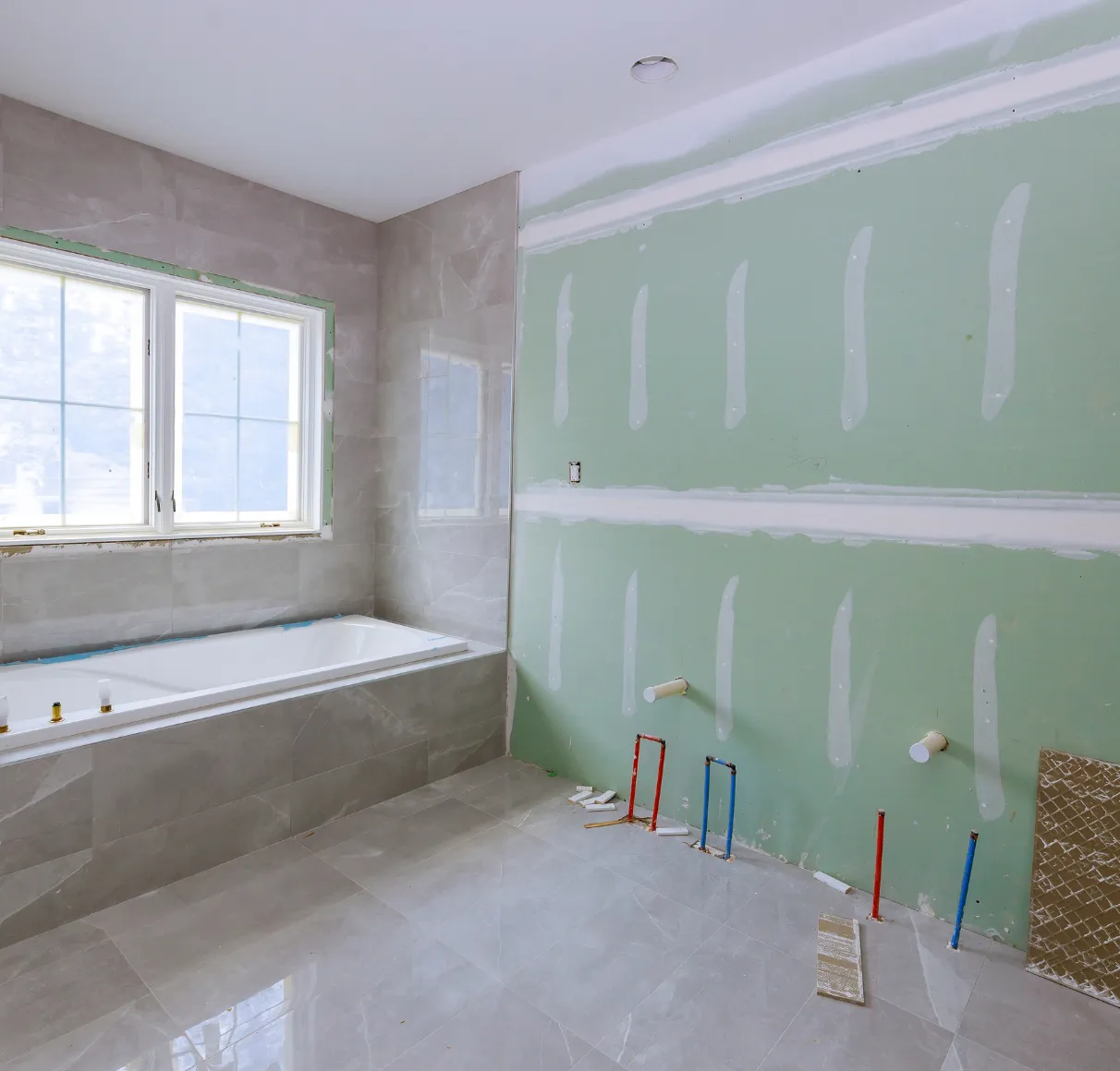 Los Angeles remodeling contractors reviewing renovation plans for home improvement project planning and estimate preparation