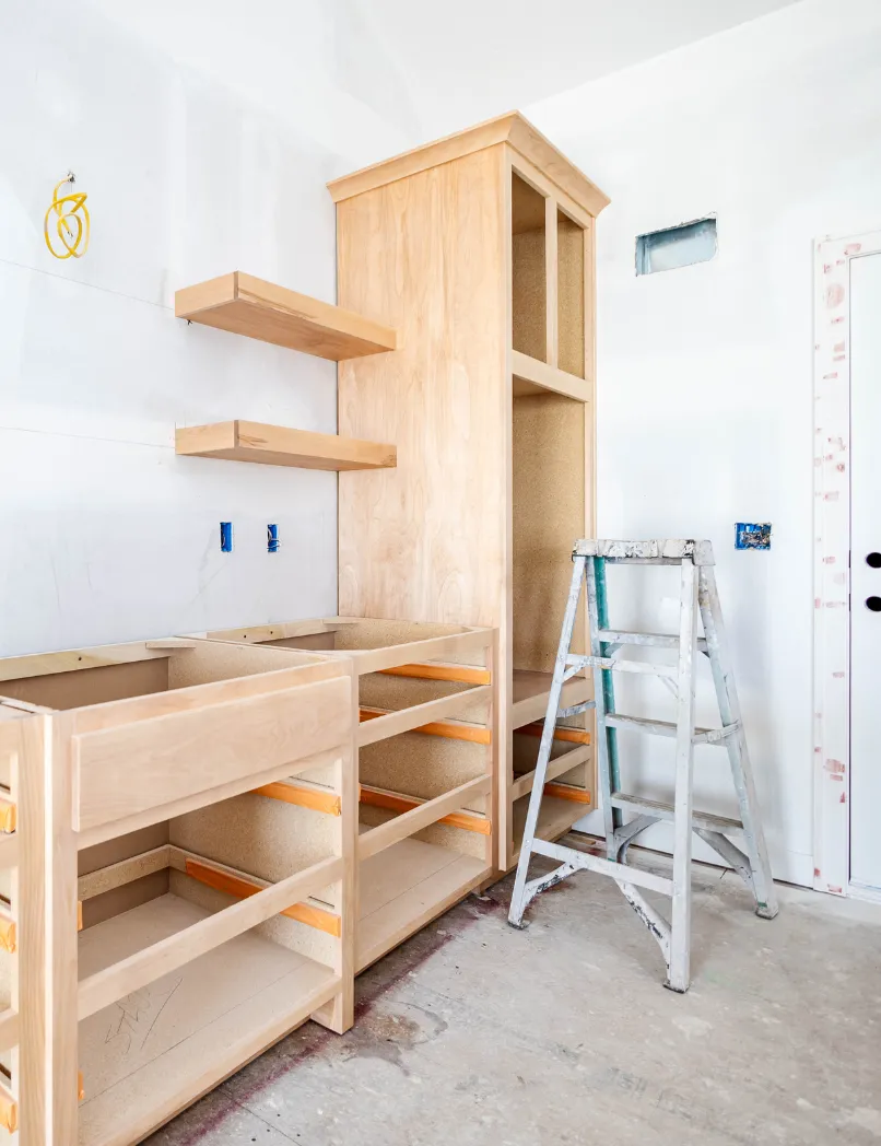 Los Angeles kitchen remodeling project with custom cabinet framing, storage buildout, shelving installation, and electrical preparation